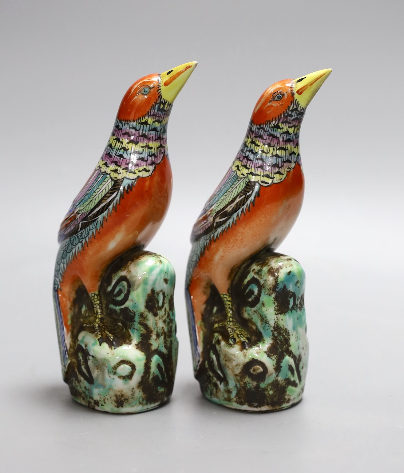 A pair of Chinese Republic ceramic birds, 19 cms high